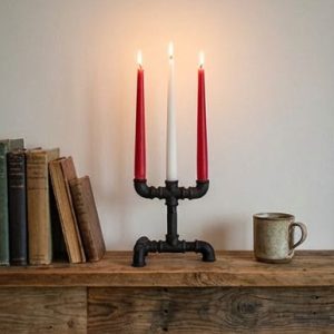Black iron loft-style triple candle holder with 3 candles on rustic wooden shelf – Choose.lv