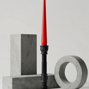 Black iron loft single candle holder with red candle on concrete geometric background – Choose.lv